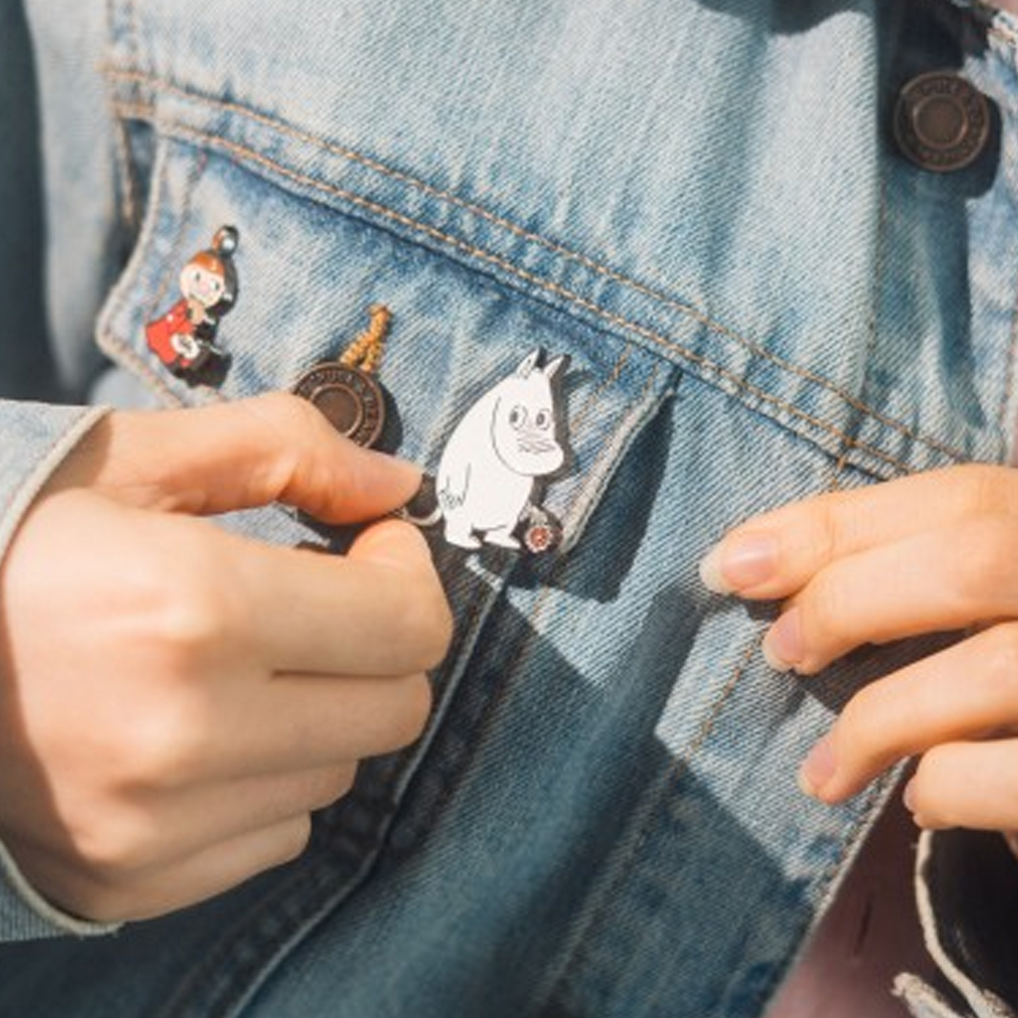 Moomins Enamelled Pin Badge Set Being Pinned to a Denim Jacket | Happy Piranha