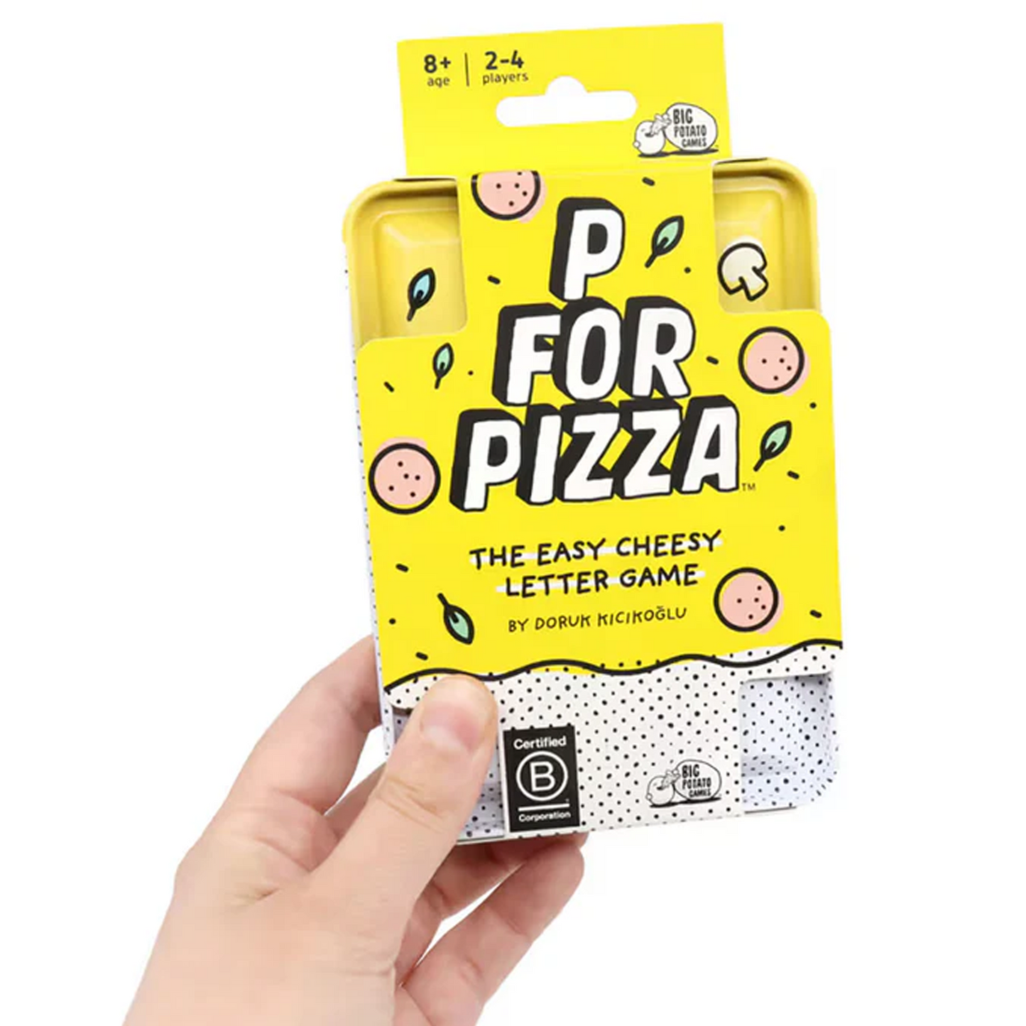 P For Pizza Travel Edition Card Game (Being Held Up in a Hand) on a White Background | Happy Piranha