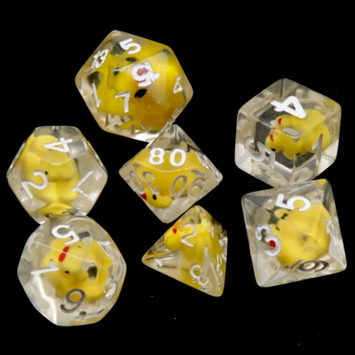 Rubbery Ducky Dice! Miniature Yellow Duck Filled Polyhedral Dice Set in a Circle on a Black Background | Happy Piranha