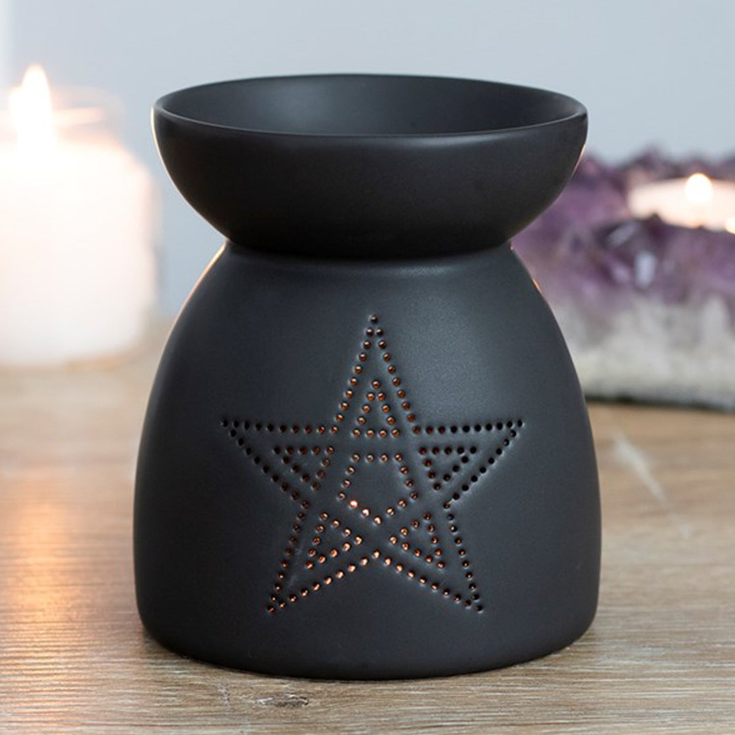 Black Pentagram Cut Out Oil Burner and Wax Melt Warmer on a Table | Happy Piranha