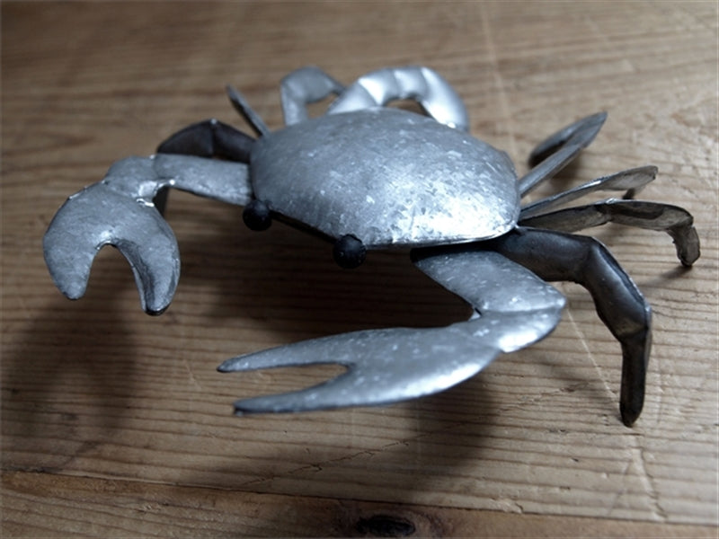 Small Colin The Crab Metal Ornament on a table | Happy Piranha