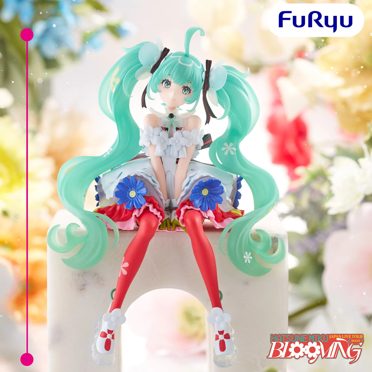 A collectible figurine of Hatsune Miku sitting on a white arch, styled with long mint green twin-tails, a white ruffled dress, blue flowers, red tights, and white shoes. The background is a soft, blurred floral scene | Hatsune Miku Japan Live Tour 2025 Blooming Noodle Stopper Figure | Happy Piranha