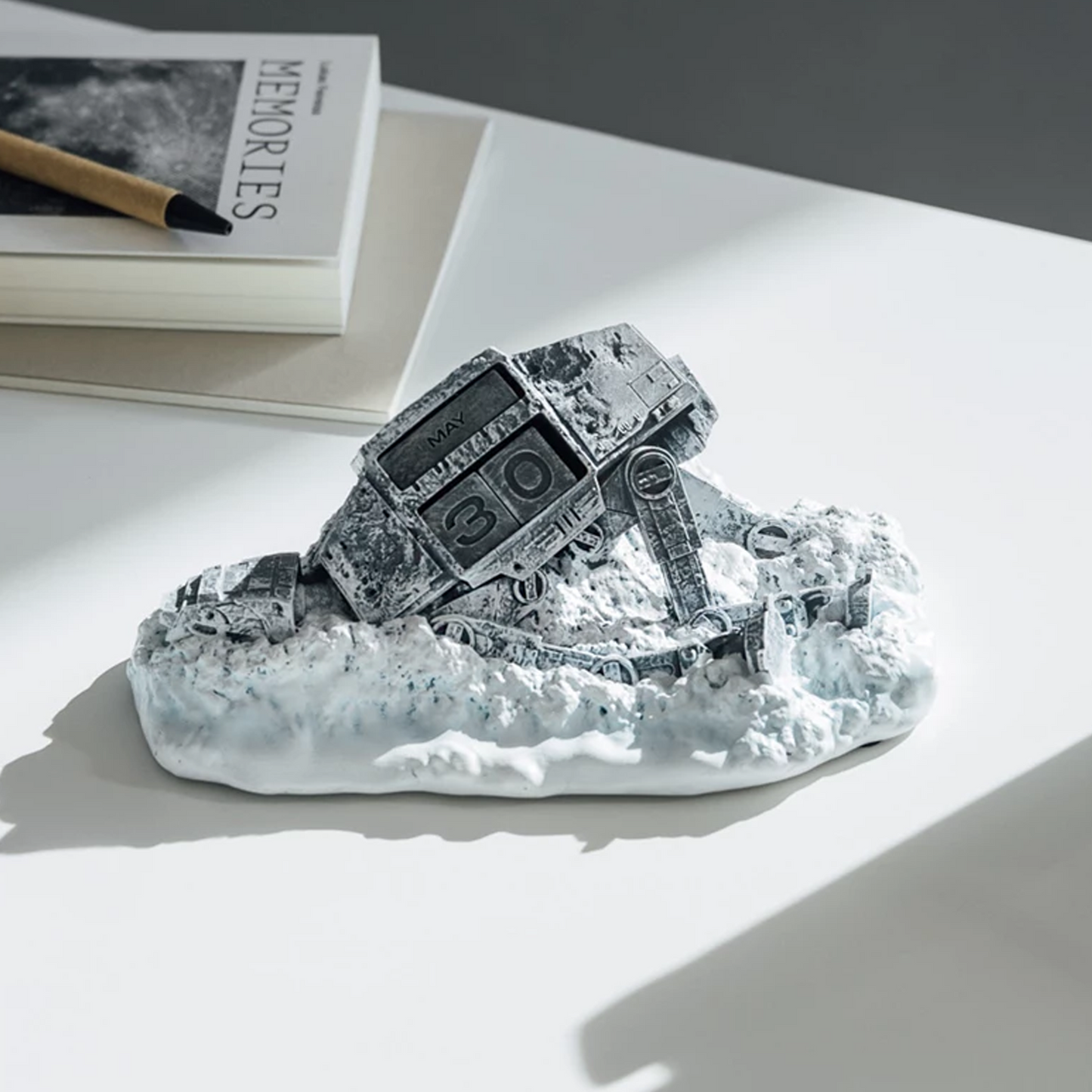Star Wars AT-AT Walker 3D Perpetual Calendar on a White Desk Next to a Book and Pen | Happy Piranha