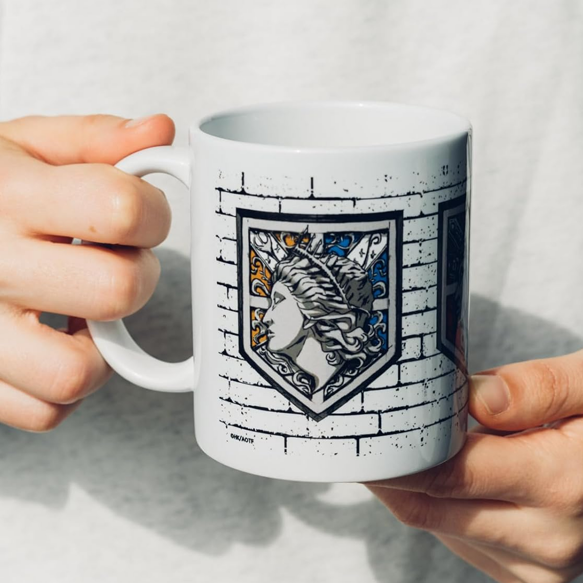 Attack on Titan The Final Season Wall Emblem 350ml Ceramic Mug Being Held in a Persons Hands  | Happy Piranha
