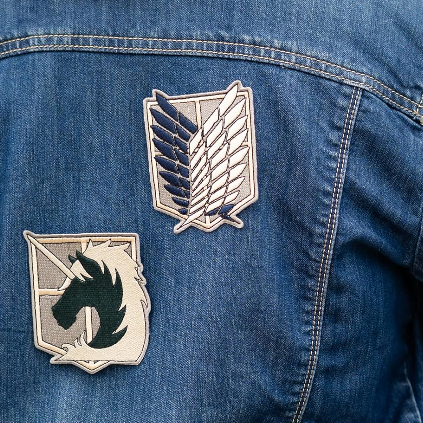 Two Attack on Titan Iron On Fabric Patches on a Denim Jacket | Happy Piranha