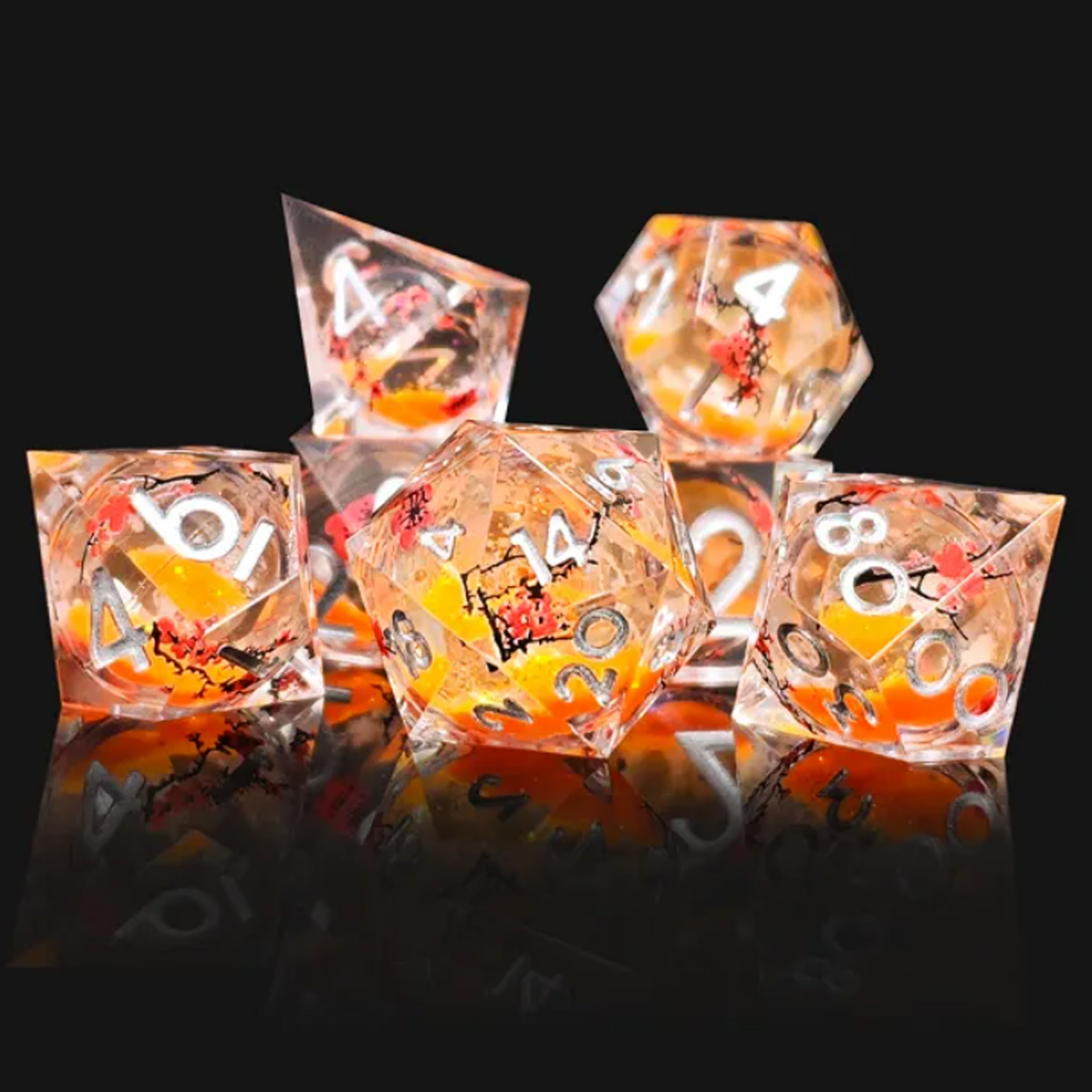 Autumn Blossom: Liquid Core Glitter Filled Cherry Blossom Polyhedral Dice Set in a Stack on a Black Background | Happy Piranha