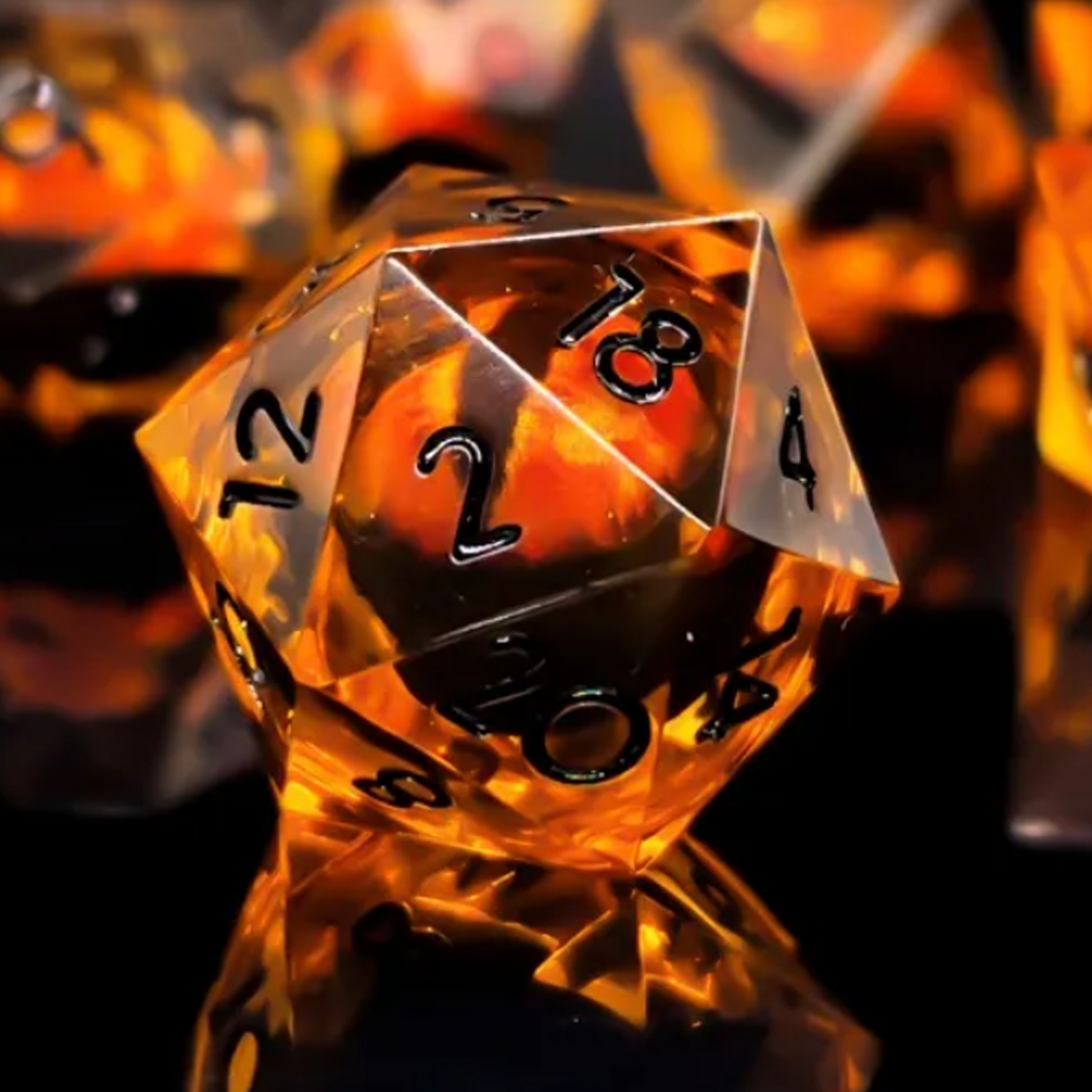 Rolling Fire Dragon Eyes: Liquid Core Sharped Edged Polyhedral Dice Set - Close up of the D20 | Happy Piranha