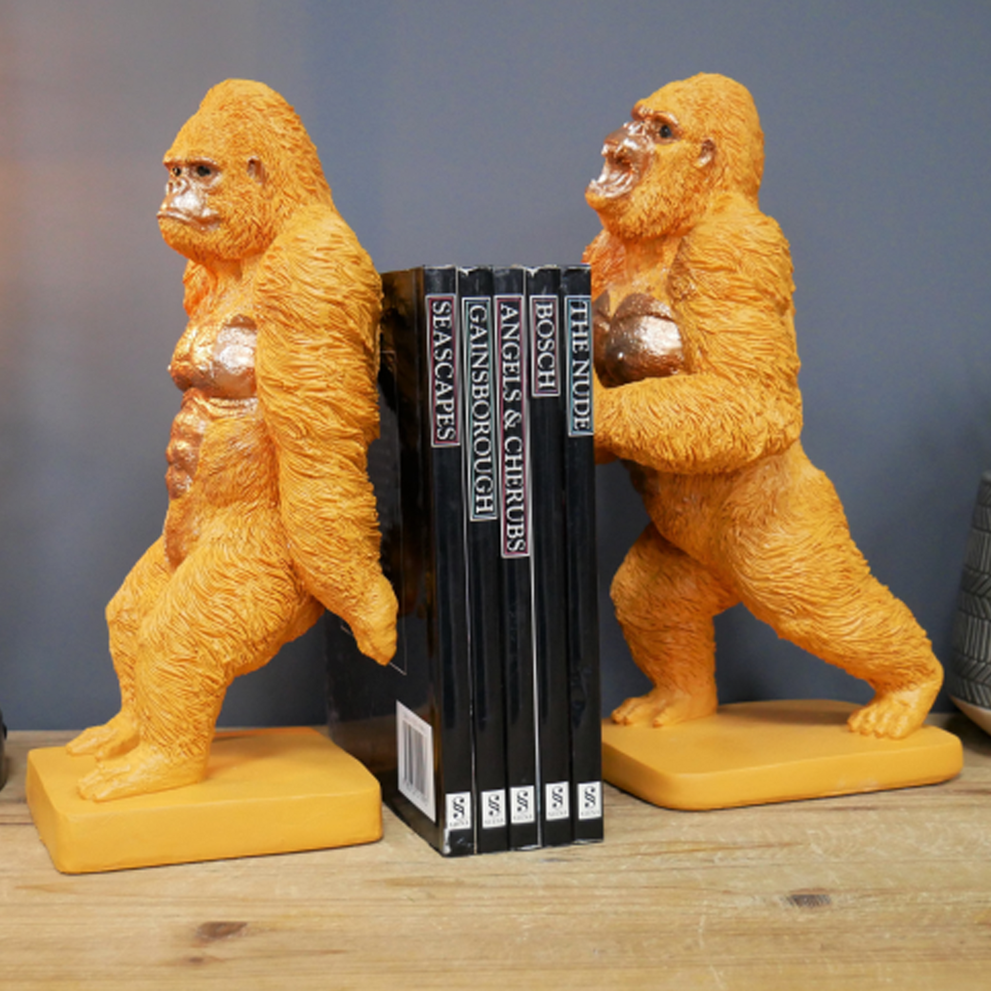 Orange & Gold Gorilla Bookends (Side, With Some Books) | Happy Piranha