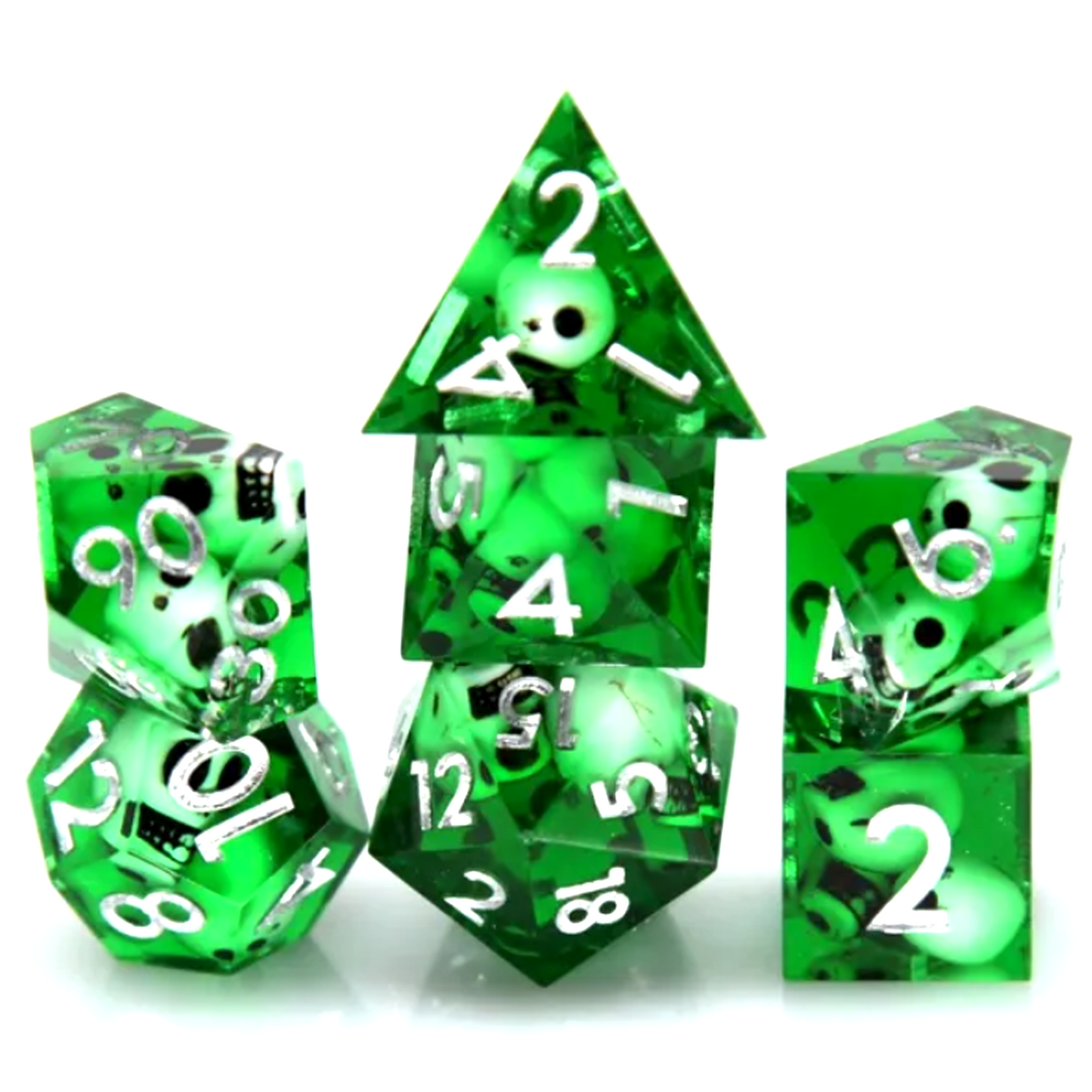 Green Miniature Skull Filled Sharped Edged Polyhedral Dice Set Stacked in a Pile on a White Background | Happy Piranha