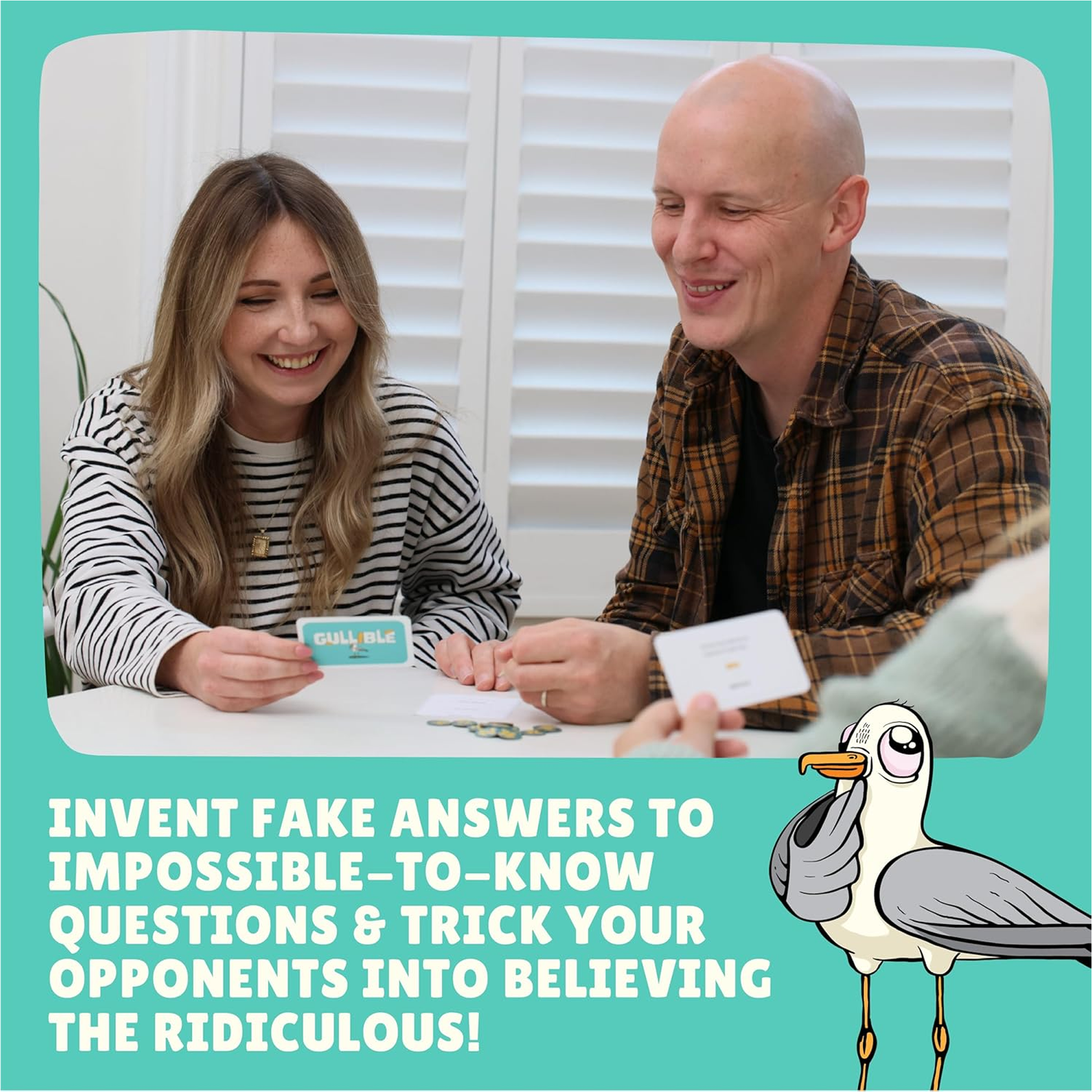 Two People Smiling and Playing Gullible, Holding Cards on a Teal Background | Happy Piranha