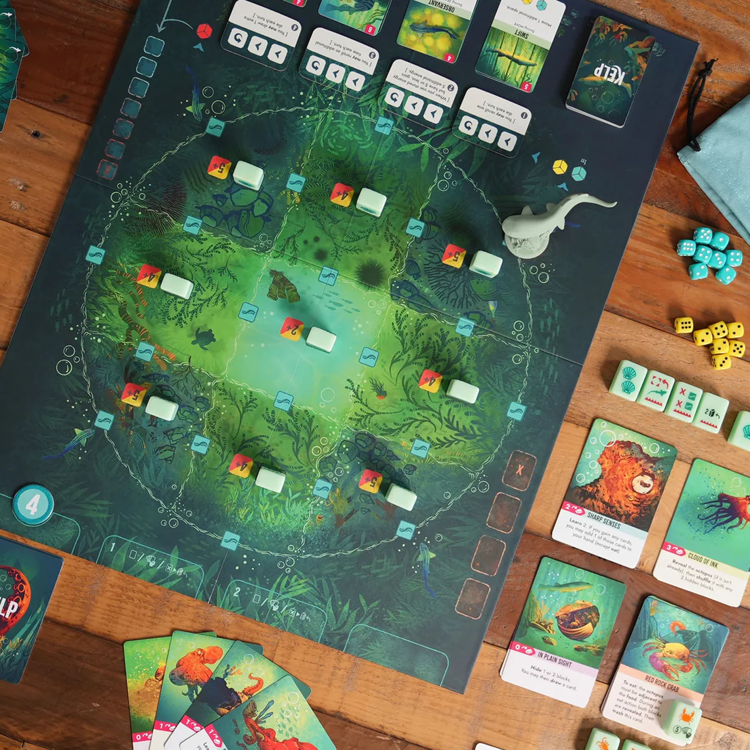 Kelp: Shark vs Octopus Board Game, Se Up on a Wooden Table and Viewed from Above | Happy Piranha