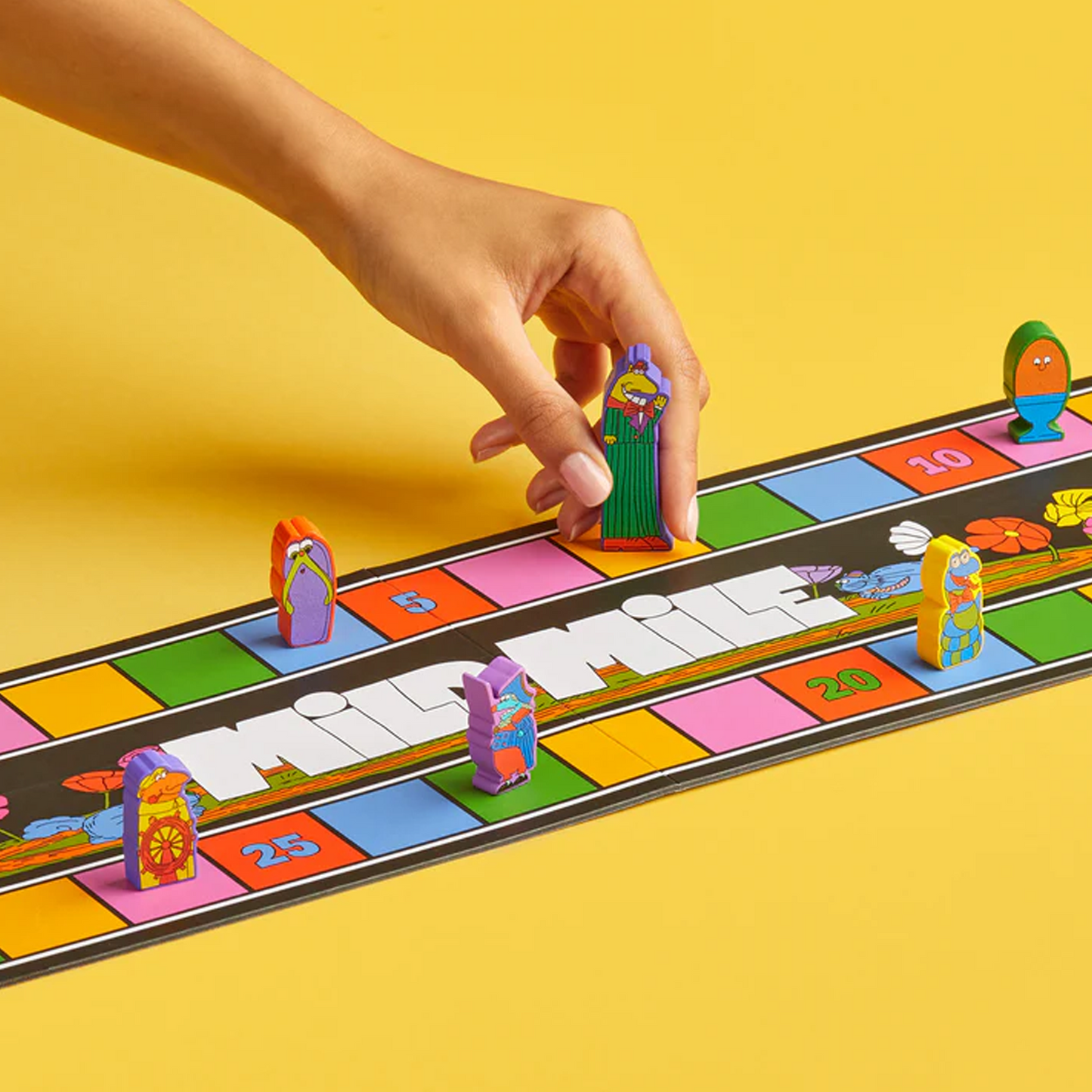 Magical Athlete Board Game (Being Played) on a Yellow Background | Happy Piranha