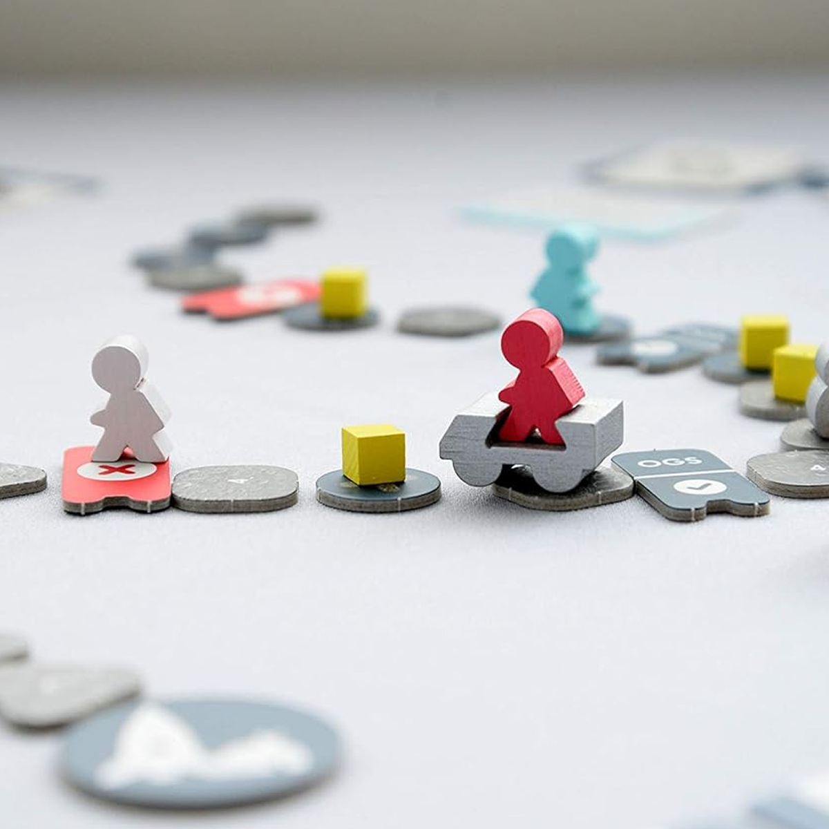 Moon Adventure Board Game (Being Played on a Grey Table) | Happy Piranha