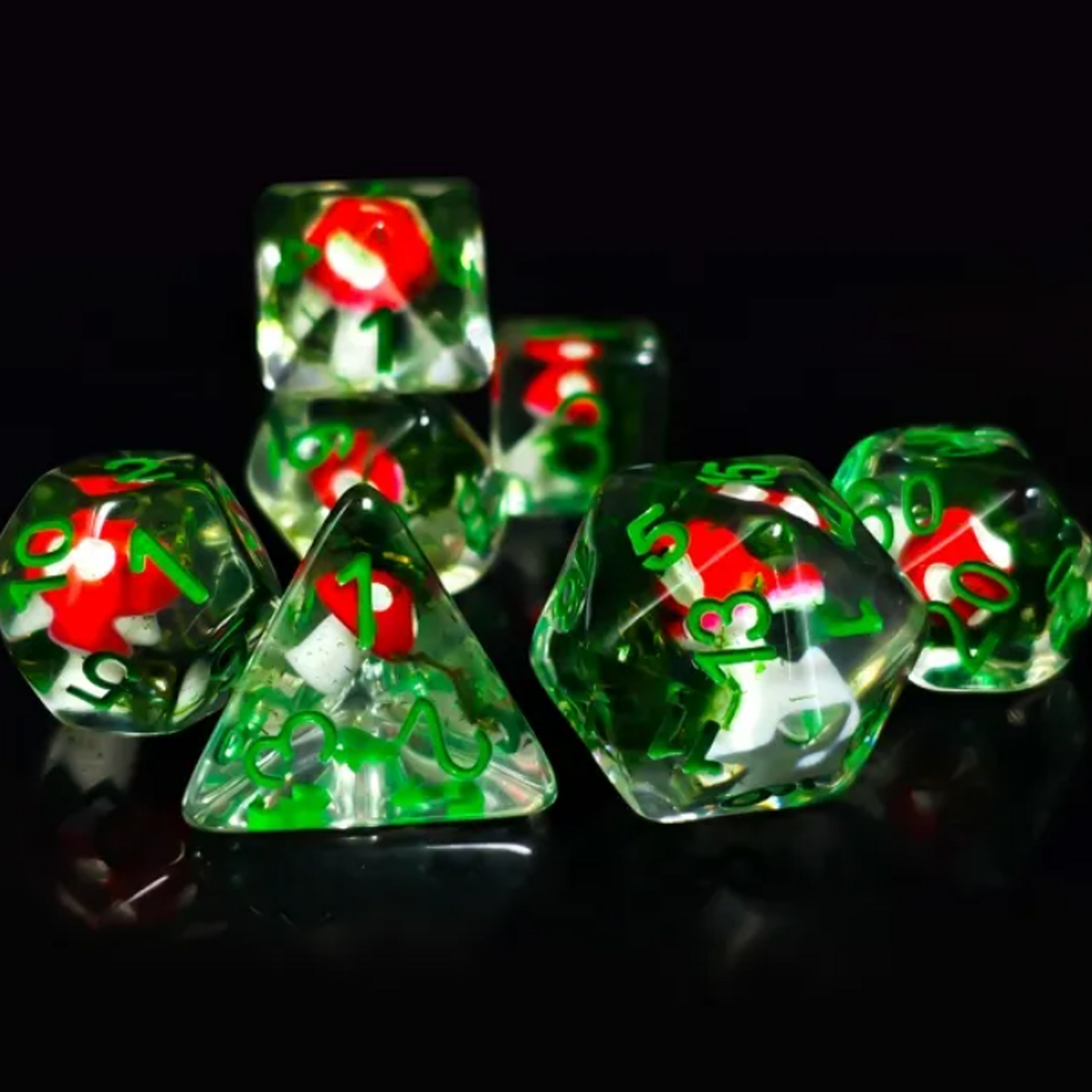 Red Toadstool Dice - Mini Mushroom Filled Polyhedral Dice Set Stacked in a Pile on a Black Background | Happy Piranha