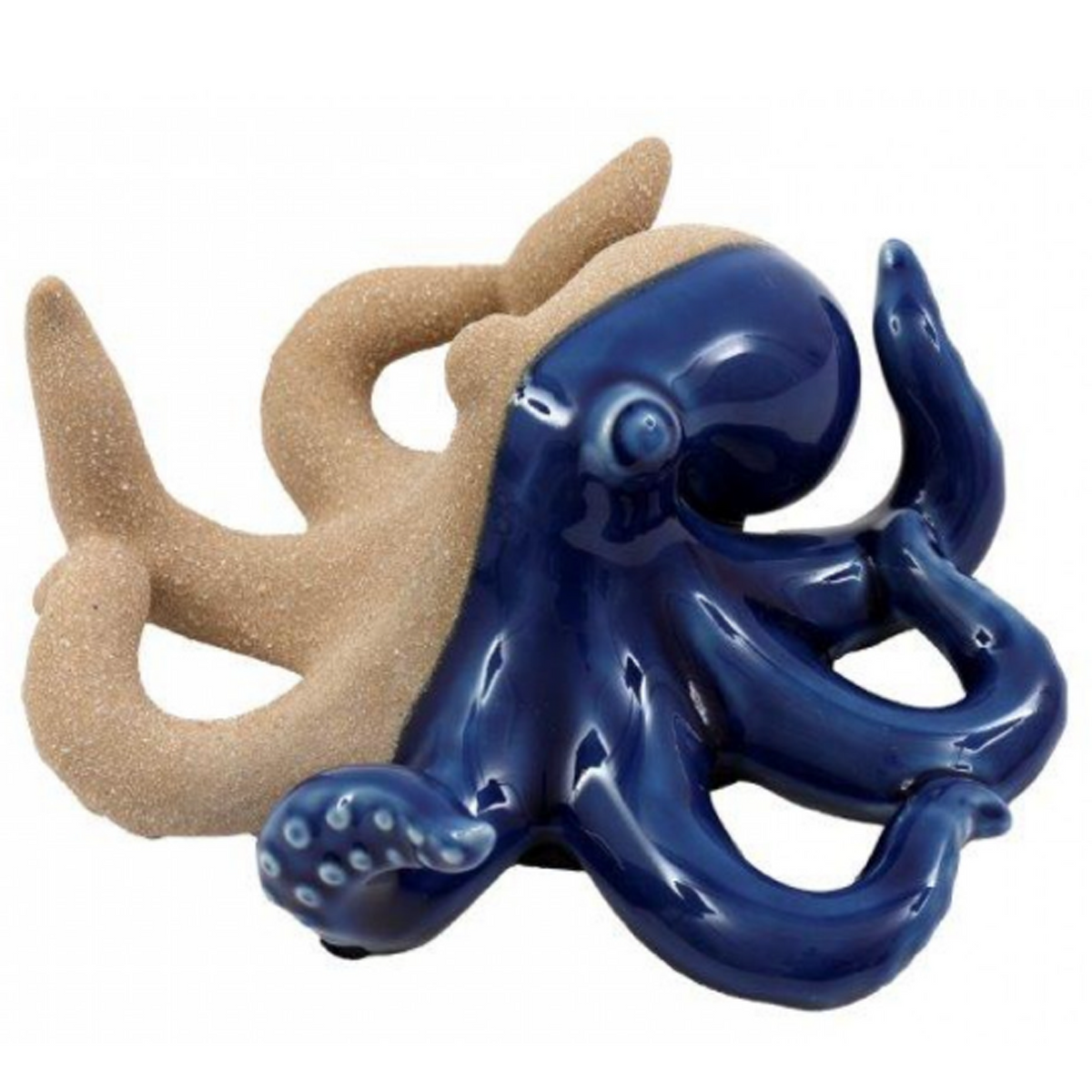 A decorative octopus figurine with a glossy dark blue body and tentacles and a matte beige sand coloured cover on one half, shown on a plain white background | Happy Piranha