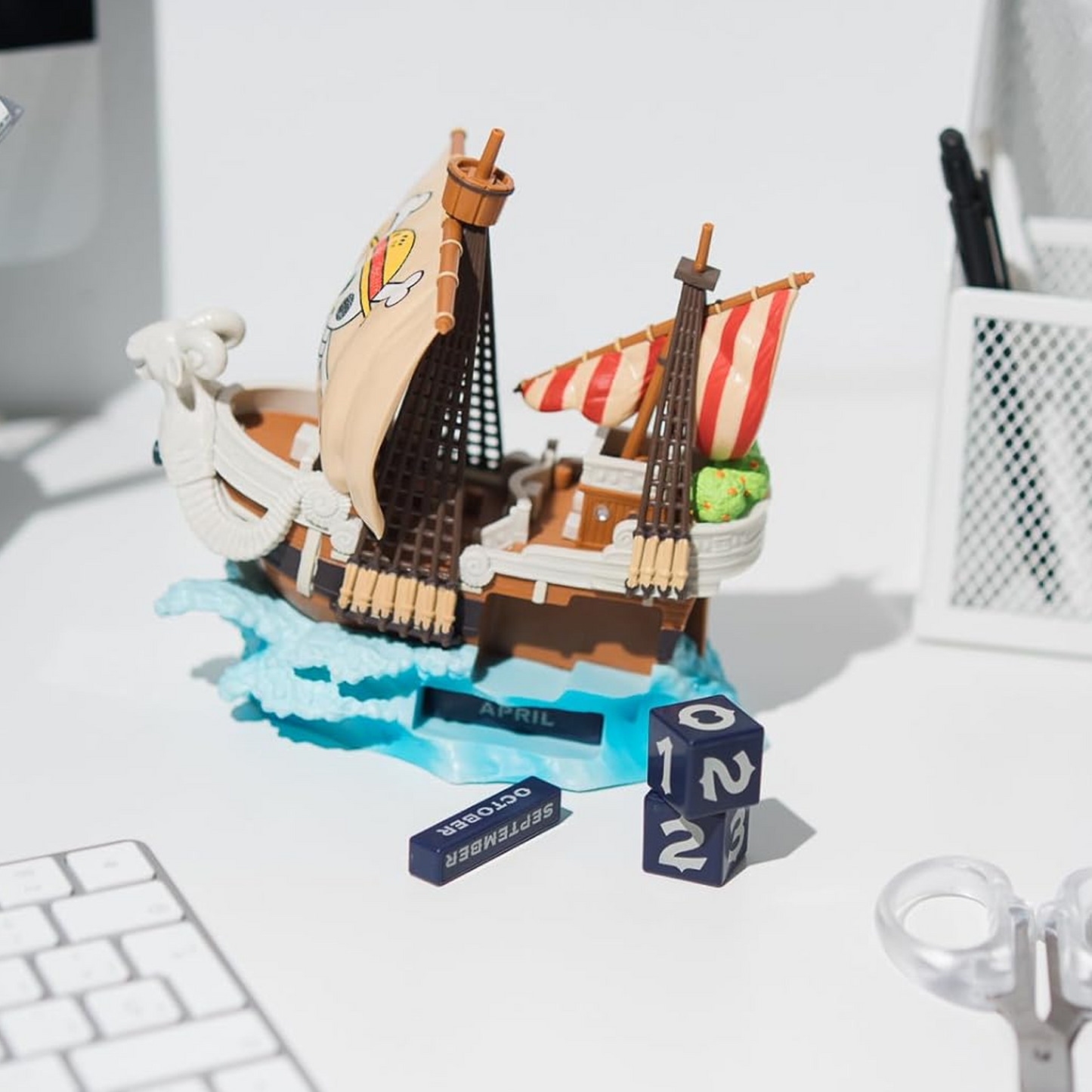 One Piece the Thousand Sunny Pirate Ship 3D Perpetual Calendar on a White Desk next to Some Stationary | Happy Piranha