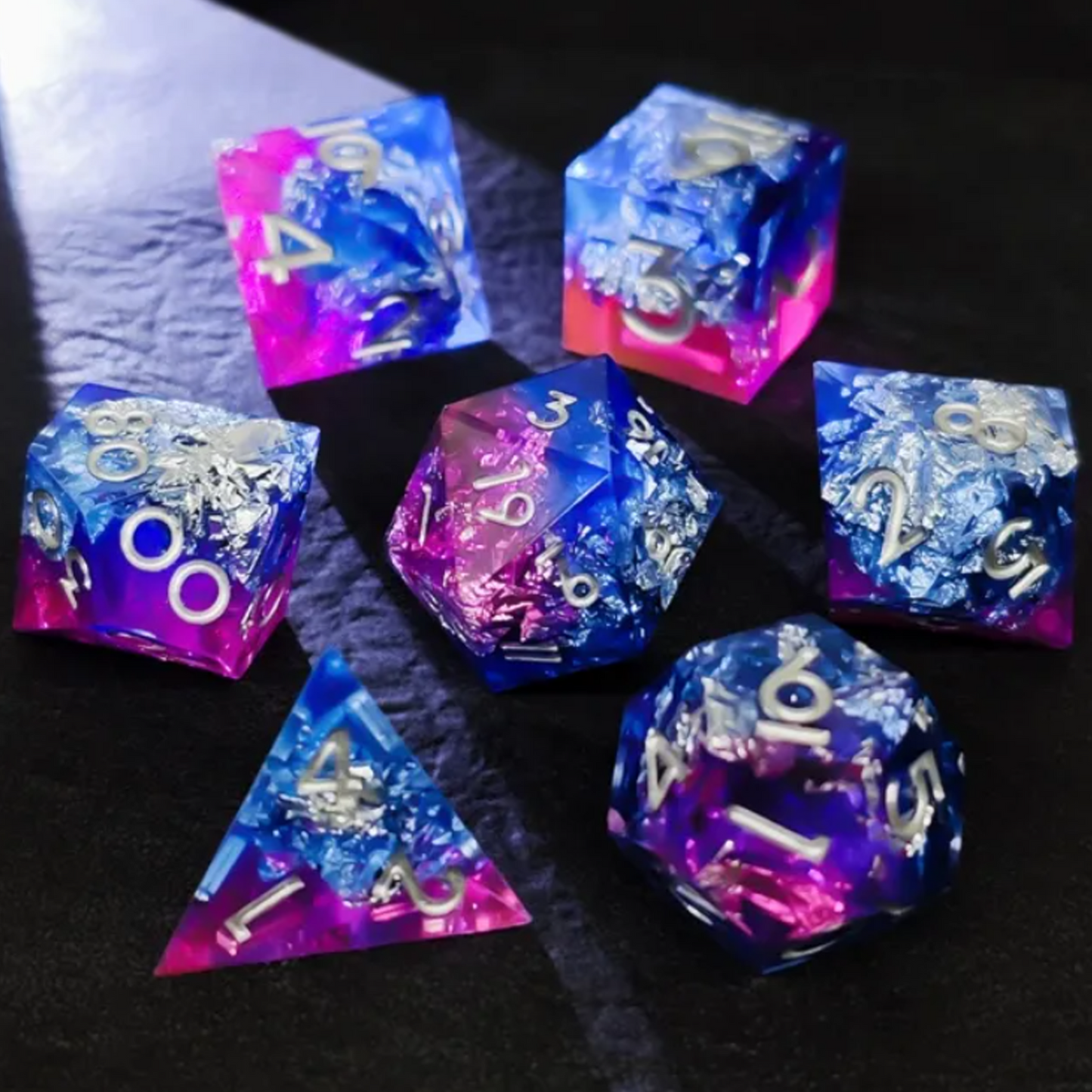Purple Glacier - Layered Sharp Edged Polyhedral Dice Set in a Circle on a Black Background with a Ray of Light Shining Through the Centre | Happy Piranha
