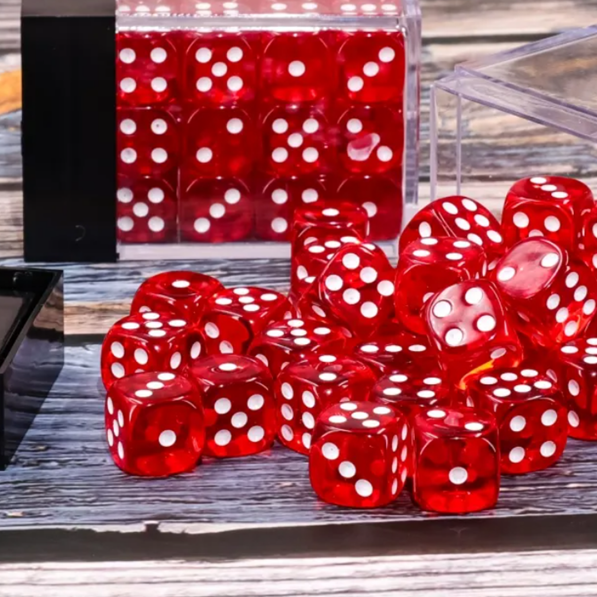 Translucent Red - 36 x 12mm 6 Sided Pip Dice D6 Set on a Table | Happy Piranha