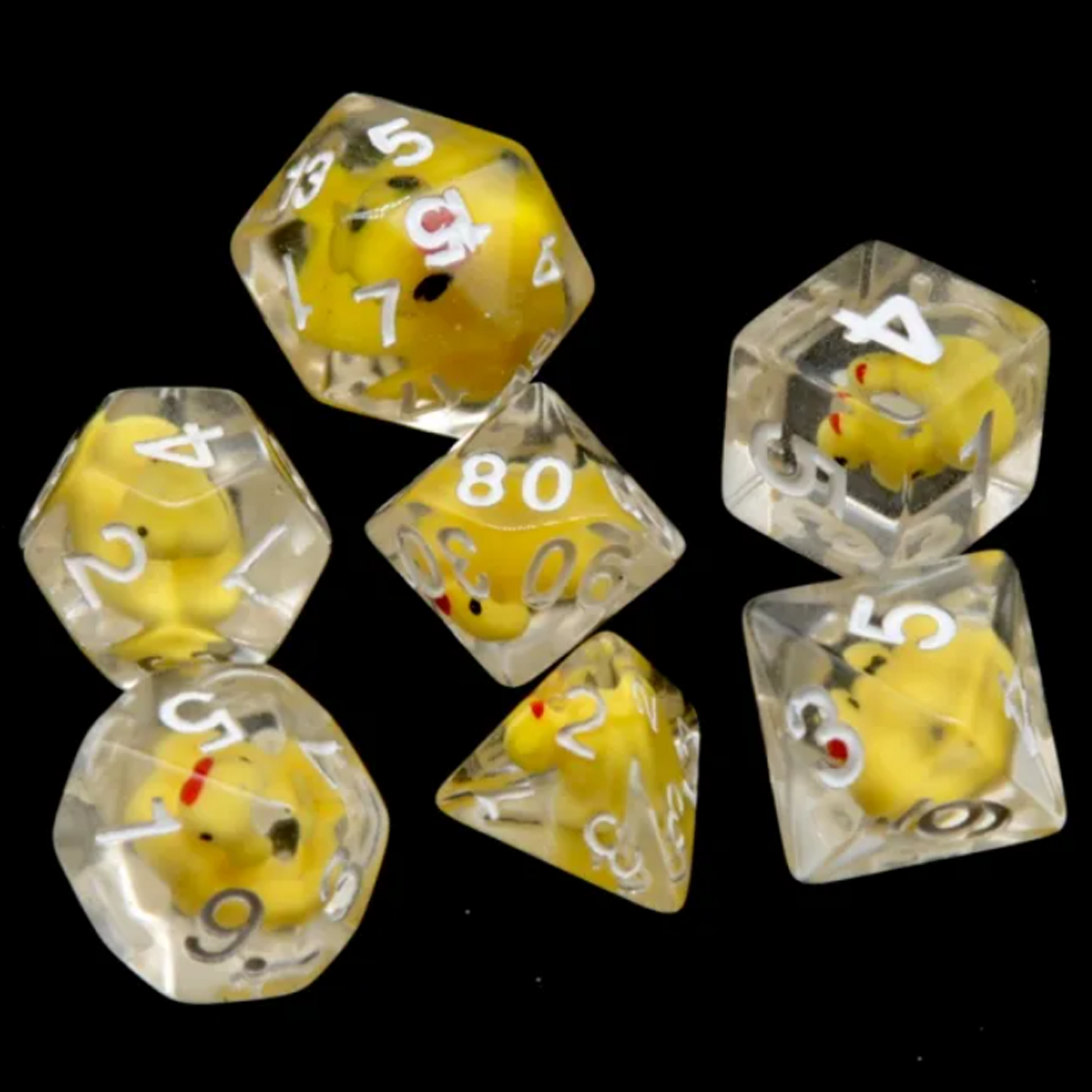 Rubbery Ducky Dice! Miniature Yellow Duck Filled Polyhedral Dice Set in a Circle on a Black Background | Happy Piranha