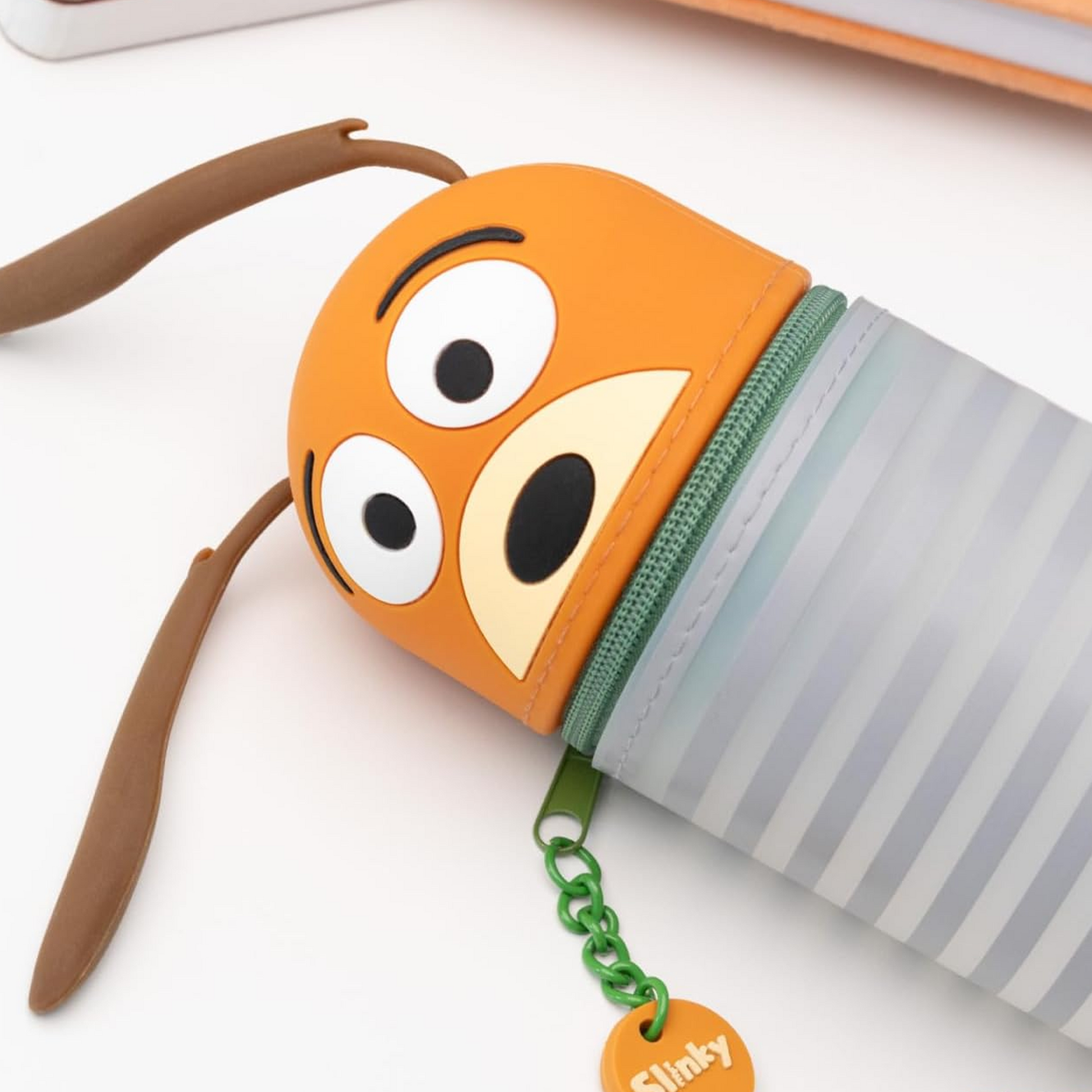 Slinky the Dog Toy Story Disney Pixar Pencil Case on a White Background on Its Side, Close Up Showing Slinkey's Face and Ears | Happy Piranha