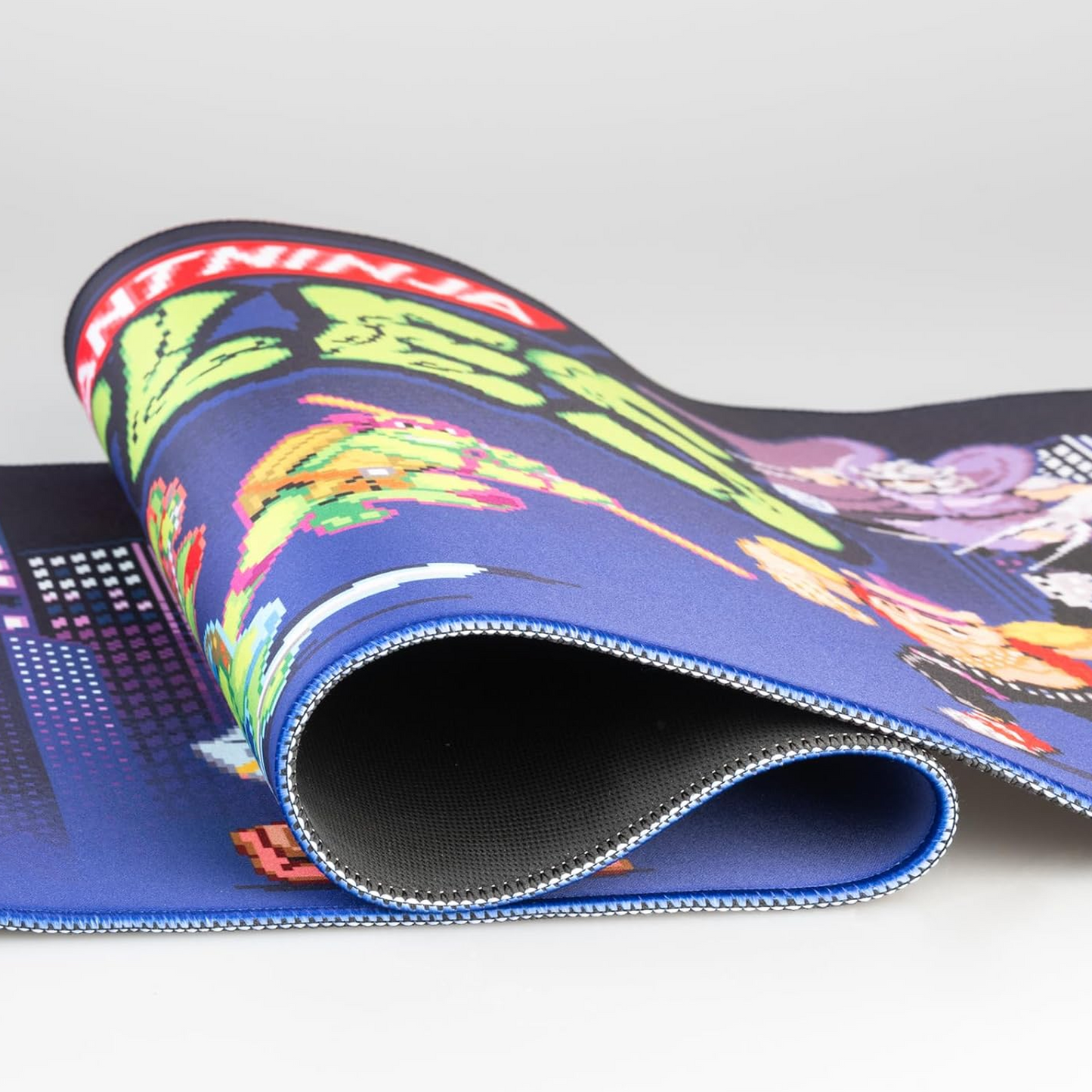 Teenage Mutant Ninja Turtles XXL 31.5 Inch Gaming Mouse Pad & Keyboard Mat Stitched Edging Close Up | Happy Piranha