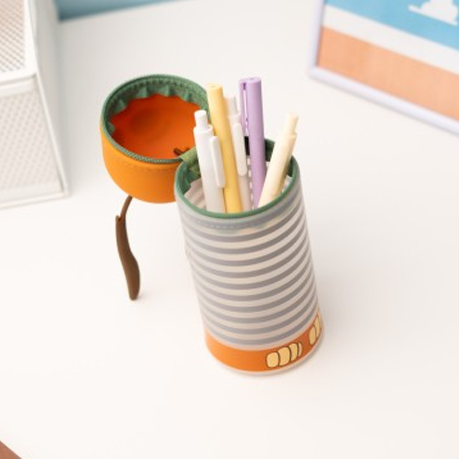 Disney Toy Story Slinky the Dog 3D Silicon Pencil Case Open on a White Desk With Pens and Pencils Inside | Happy Piranha