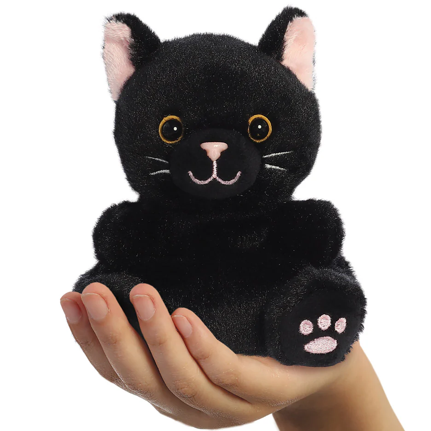 Twilight the Black Cat Palm Pal Plushie Soft Toy in a Child's Hand on a White Background | Happy Piranha
