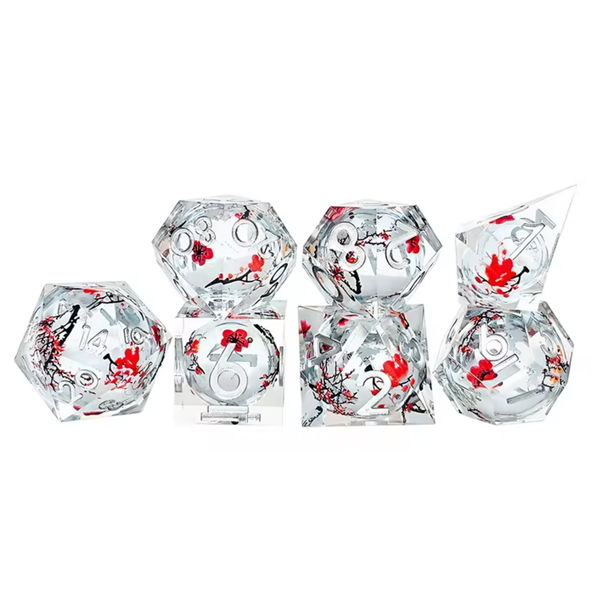 Winter Blossom: Liquid Core Glitter Filled Cherry Blossom Polyhedral Dice Set Stacked in a Pile in a Line on a White Background | Happy Piranha