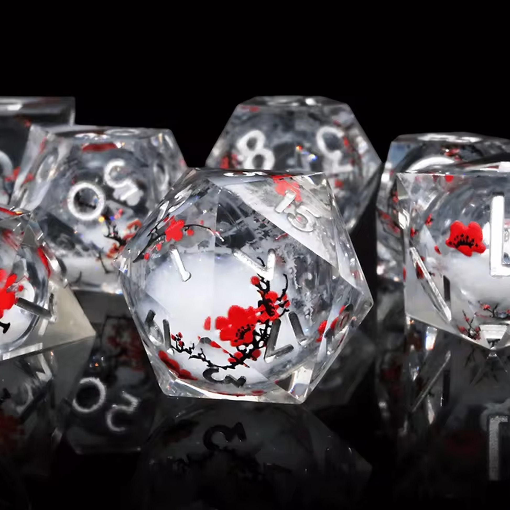 Winter Blossom: Liquid Core Glitter Filled Cherry Blossom Polyhedral Dice Set Close up on a Black Background | Happy Piranha