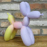 Yellow & Purple Gradient Balloon Dog 30cm Ornament on a Desk | Happy Piranha