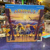 Akropolis Board Game on the Counter at Happy Piranha | Happy Piranha