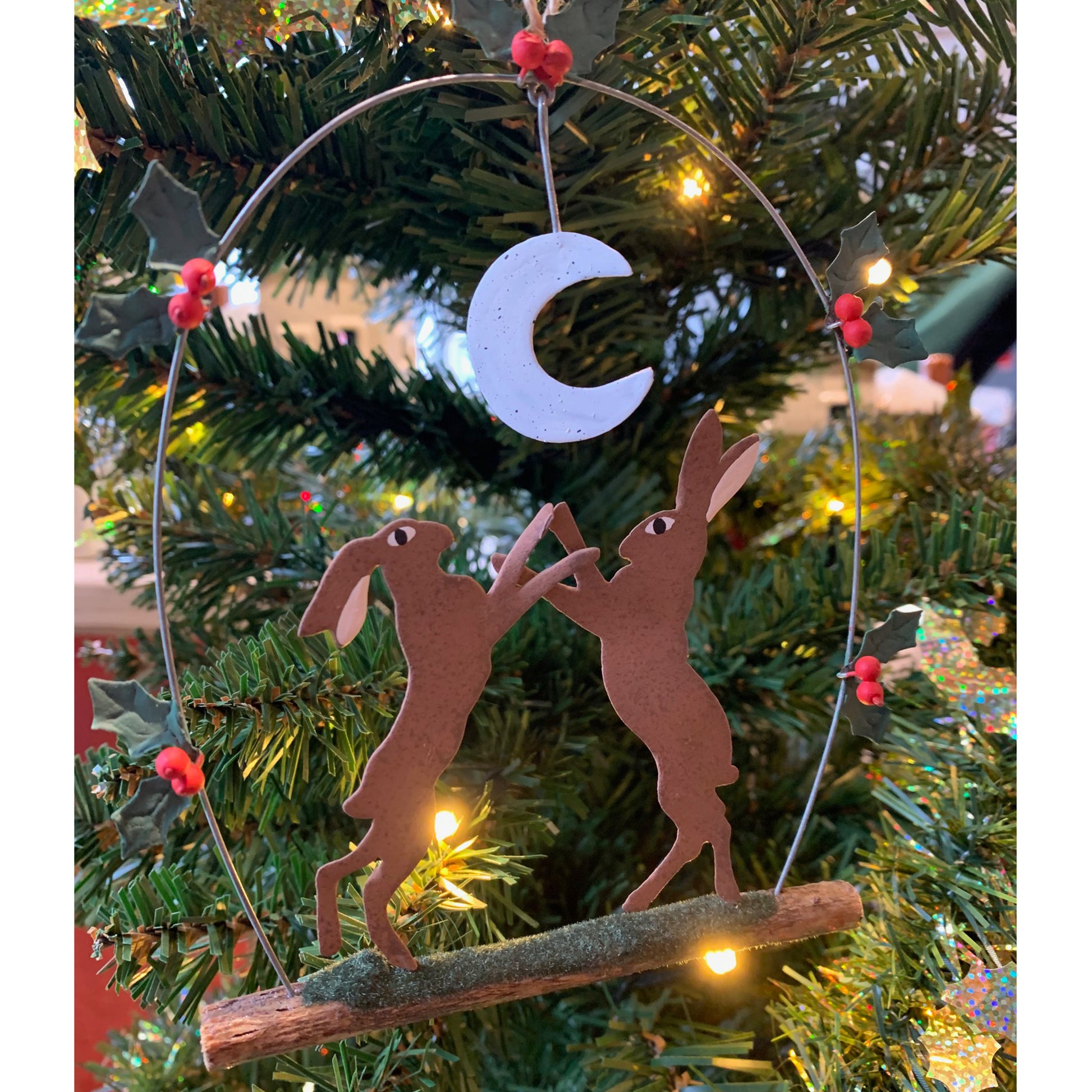 Boxing Hares: Hanging Christmas Decoration Hanging in a Tree | Happy Piranha
