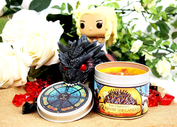 Daenerys Targaryen funko on a dragon with the unburnt candles