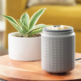 Grey Hobnail : Flip-Top Silicone Lid Electric Wax Melt & Fragrance Warmer on a Table by a Plant | Happy Piranha