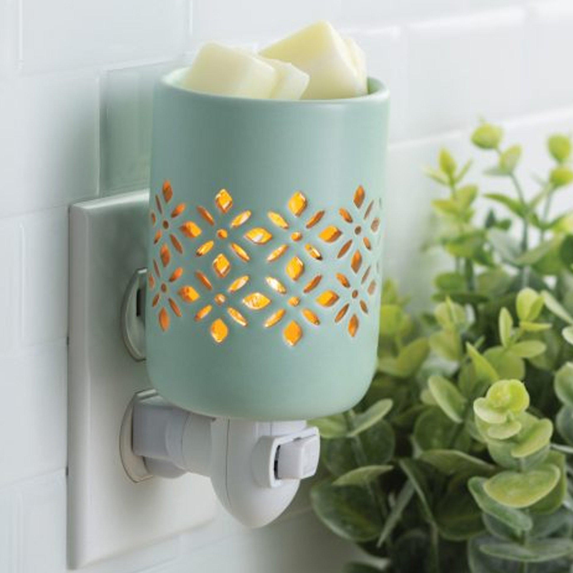 Soft Mint: Plug in Fragrance and Wax Melt Warmer Plugged into a Kitchen Wall | Happy Piranha