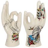 White Tattooed Palmistry Hand | Happy Piranha